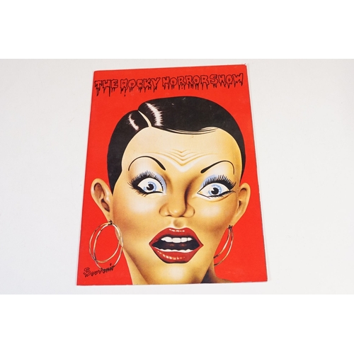 331 - A Rocky Horror Picture Show vinyl picture disc together with four souvenir programmes.