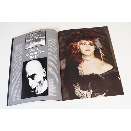 331 - A Rocky Horror Picture Show vinyl picture disc together with four souvenir programmes.