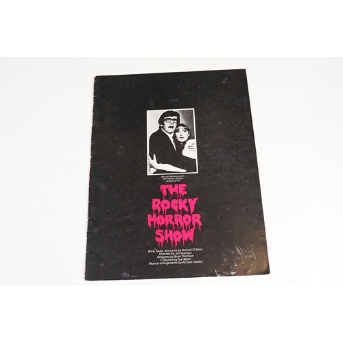 331 - A Rocky Horror Picture Show vinyl picture disc together with four souvenir programmes.