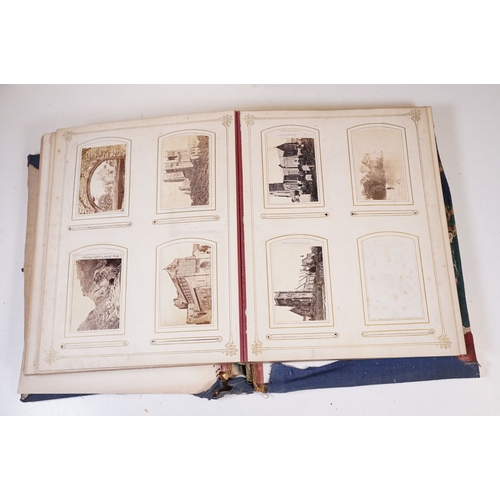 418 - A large collection of Carte De Viste / CDV calling card photographs contained within four fitted alb... 