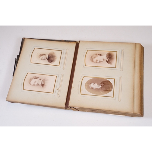 418 - A large collection of Carte De Viste / CDV calling card photographs contained within four fitted alb... 