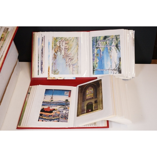 419 - A large collection of judges postcards together with a selection of art cards within two albums.