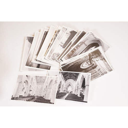 419 - A large collection of judges postcards together with a selection of art cards within two albums.