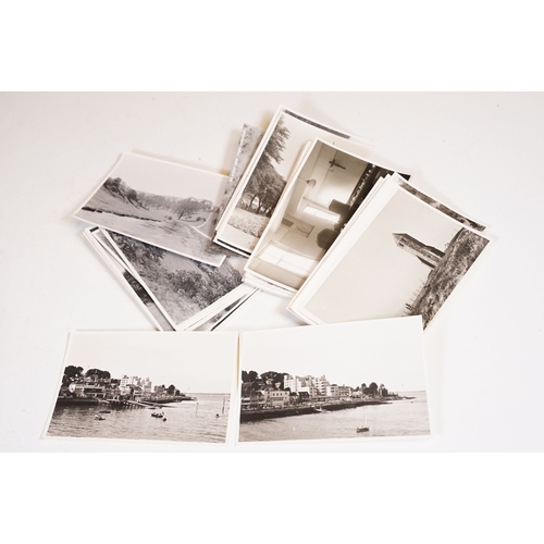 419 - A large collection of judges postcards together with a selection of art cards within two albums.