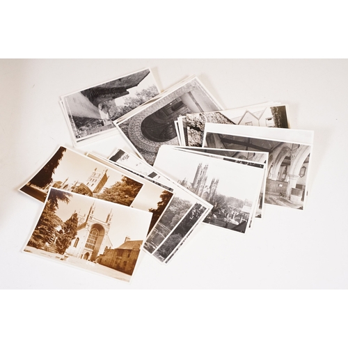 419 - A large collection of judges postcards together with a selection of art cards within two albums.