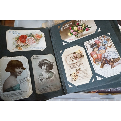 429 - A large collection of early to mid 20th century postcards to include printed and real photo examples... 