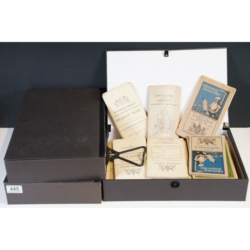 445 - A collection of early to mid 20th century Ordnance Survey maps to include cloth examples, contained ... 