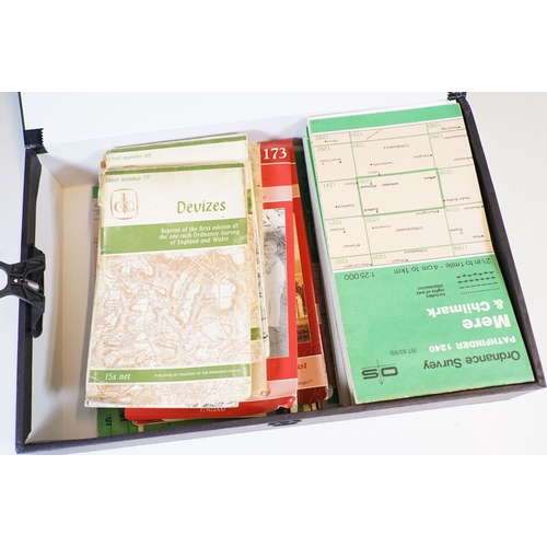 445 - A collection of early to mid 20th century Ordnance Survey maps to include cloth examples, contained ... 