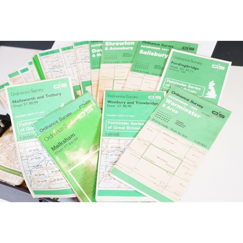 445 - A collection of early to mid 20th century Ordnance Survey maps to include cloth examples, contained ... 