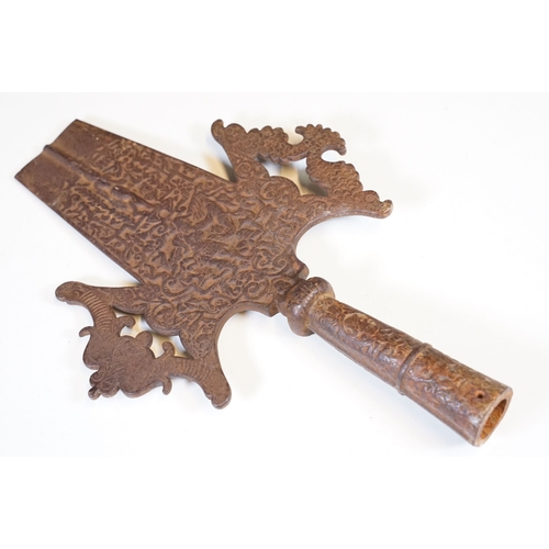 90 - Polearm head with intricate relief work and decorative side lugs, H 35.5cm, W 23cm