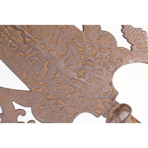 90 - Polearm head with intricate relief work and decorative side lugs, H 35.5cm, W 23cm
