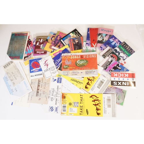 406 - A small collection of NME / New Musical Express newspaper magazines and a selection of backstage pas... 