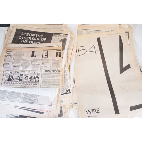 406 - A small collection of NME / New Musical Express newspaper magazines and a selection of backstage pas... 