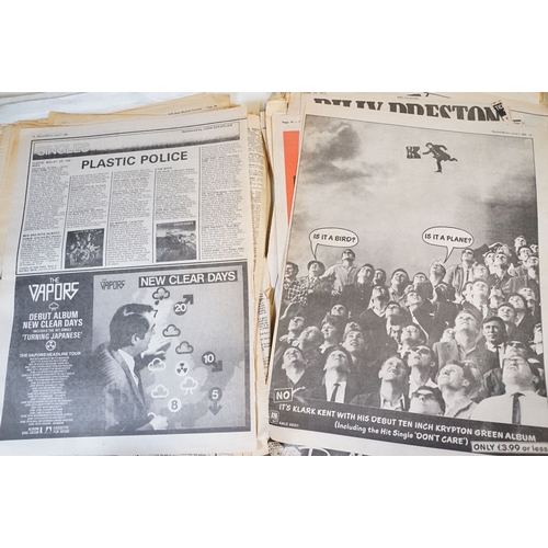 406 - A small collection of NME / New Musical Express newspaper magazines and a selection of backstage pas... 