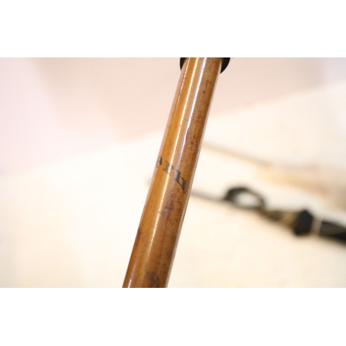 335 - Victorian parasol, with carved ebonised handle and black silk canopy, a Victorian parasol with carve... 