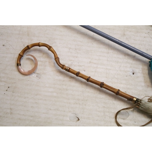 335 - Victorian parasol, with carved ebonised handle and black silk canopy, a Victorian parasol with carve... 