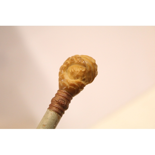 335 - Victorian parasol, with carved ebonised handle and black silk canopy, a Victorian parasol with carve... 