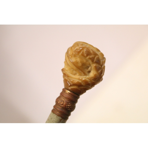 335 - Victorian parasol, with carved ebonised handle and black silk canopy, a Victorian parasol with carve... 