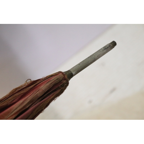 335 - Victorian parasol, with carved ebonised handle and black silk canopy, a Victorian parasol with carve... 