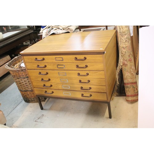 592 - 20th century industrial design plan chest, having six long drawers raised on metal legs, W 95cm x D ... 