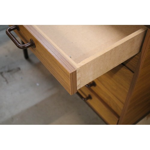 592 - 20th century industrial design plan chest, having six long drawers raised on metal legs, W 95cm x D ... 