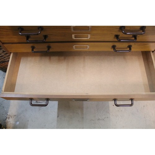 592 - 20th century industrial design plan chest, having six long drawers raised on metal legs, W 95cm x D ... 