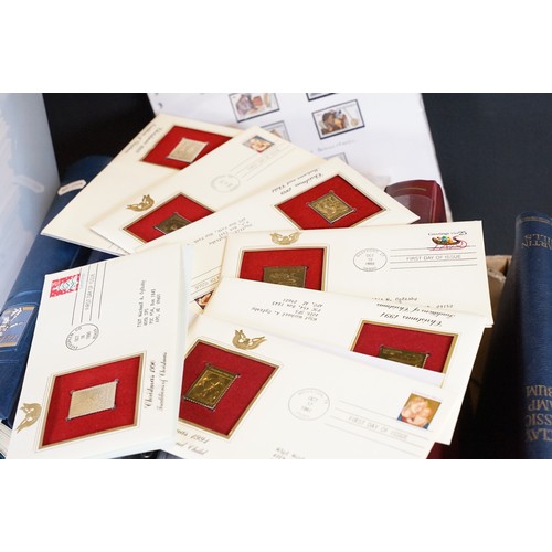 409 - A large collection of world first day covers together with a selection of stamps within albums to in... 