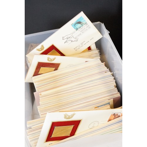 409 - A large collection of world first day covers together with a selection of stamps within albums to in... 