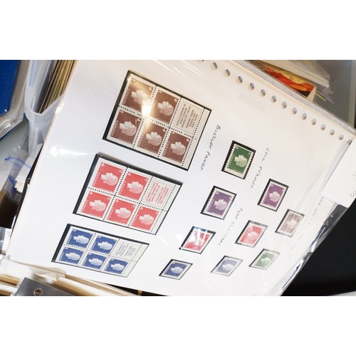 409 - A large collection of world first day covers together with a selection of stamps within albums to in... 