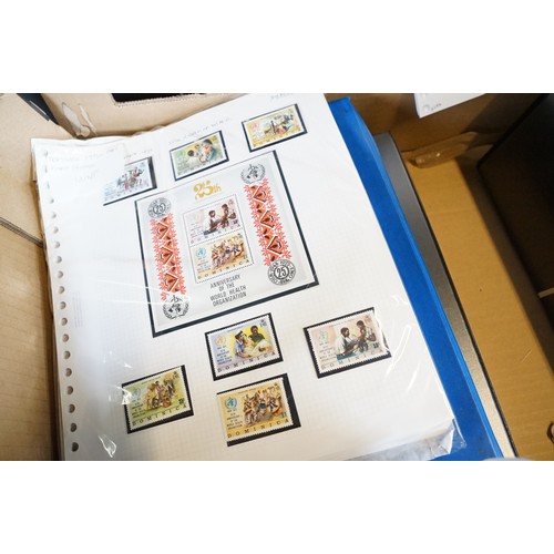 409 - A large collection of world first day covers together with a selection of stamps within albums to in... 