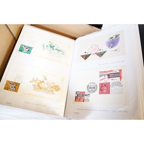 409 - A large collection of world first day covers together with a selection of stamps within albums to in... 