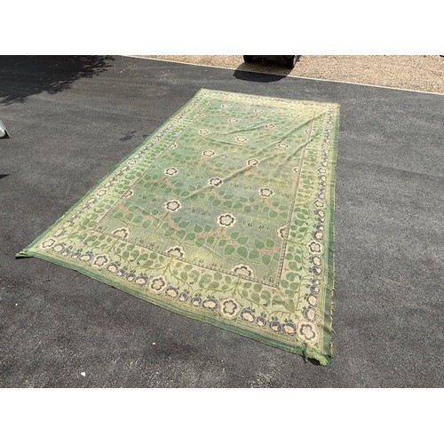 656 - Green ground rug, possibly a Donegal carpet, having intertwined foliage design to pond and border, 4... 