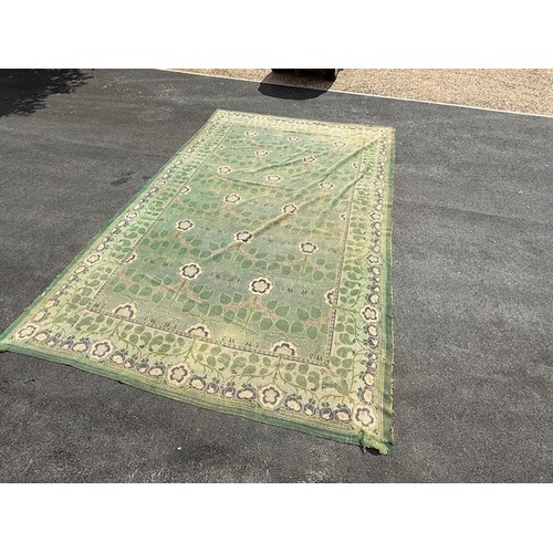 656 - Green ground rug, possibly a Donegal carpet, having intertwined foliage design to pond and border, 4... 