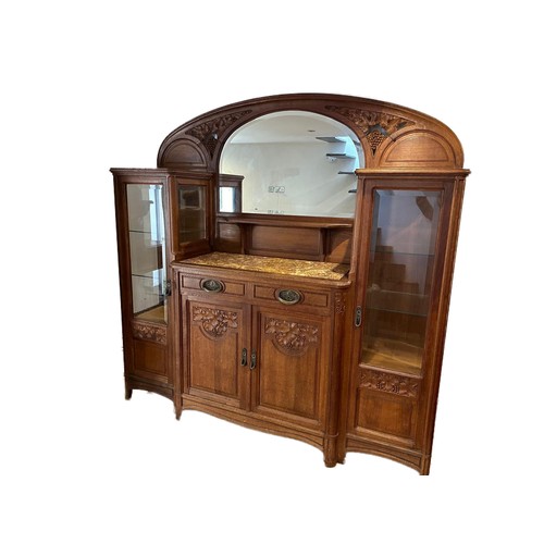 617 - Early 20th century oak chiffonier, having large mirror back with bevelled arched plate enclosed with... 