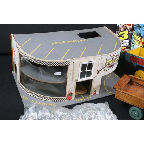 379 - Collection of mixed toys to include Triang garage, 3 x comics, 'Wood Products' wooden truck, etc