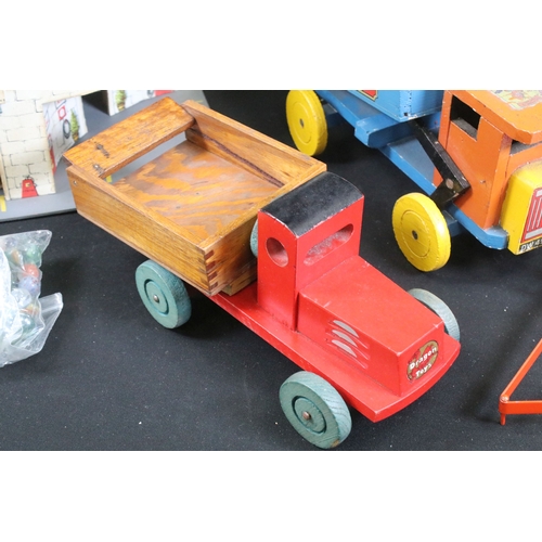 379 - Collection of mixed toys to include Triang garage, 3 x comics, 'Wood Products' wooden truck, etc