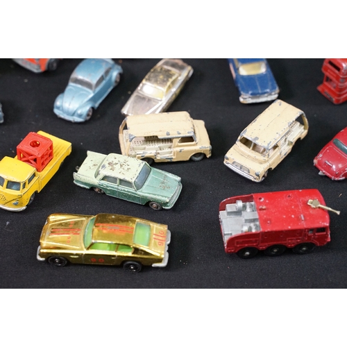 1397 - Around 65 mid 20th C play worn diecast models to include Corgi, Matchbox and Dinky featuring Corgi B... 