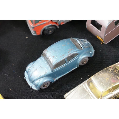 1397 - Around 65 mid 20th C play worn diecast models to include Corgi, Matchbox and Dinky featuring Corgi B... 