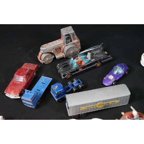 1397 - Around 65 mid 20th C play worn diecast models to include Corgi, Matchbox and Dinky featuring Corgi B... 