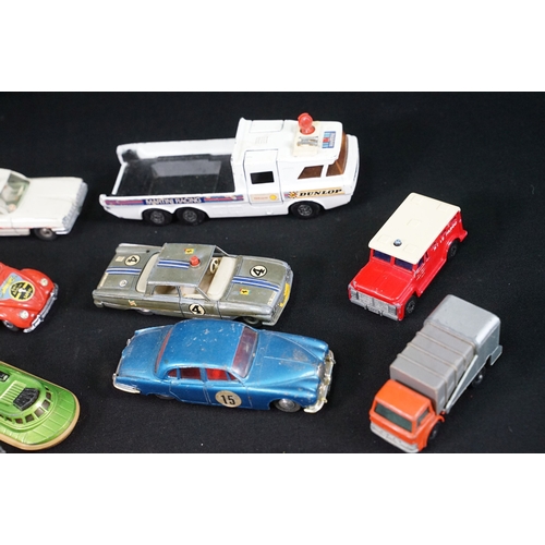 1397 - Around 65 mid 20th C play worn diecast models to include Corgi, Matchbox and Dinky featuring Corgi B... 