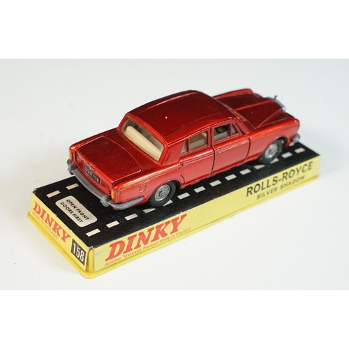 1414 - Three cased Dinky diecast models to include 158 Rolls Royce Silver Shadow in metallic red, 163 Volks... 