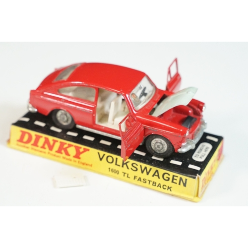 1414 - Three cased Dinky diecast models to include 158 Rolls Royce Silver Shadow in metallic red, 163 Volks... 