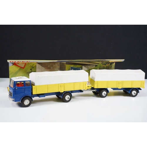1418 - Four boxed Dinky commercial diecast models to include 917 Mercedes Benz Truck and Trailer (with inne... 