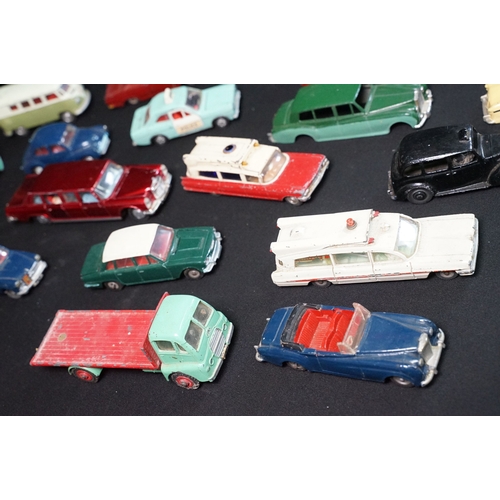 1422 - 40 Mid 20th C play worn diecast models to include Corgi & Dinky featuring Dinky Police Ford Escort, ... 