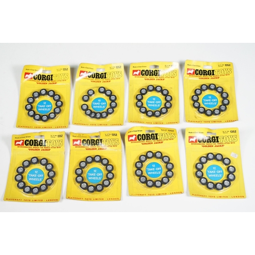 1385 - 18 Carded Corgi 1352 Golden Jacks Take off Wheel sets, complete and unopened, showing card bend and ... 