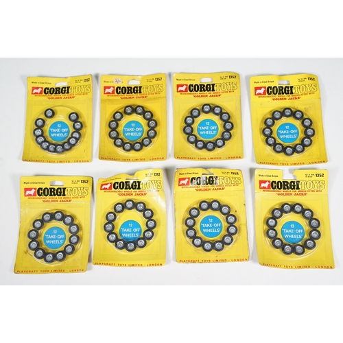 1385 - 18 Carded Corgi 1352 Golden Jacks Take off Wheel sets, complete and unopened, showing card bend and ... 