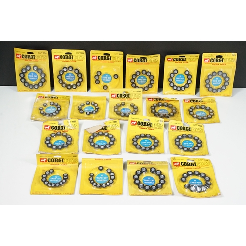 1391 - 19 Carded Corgi Golden Jacks Take off Wheel sets, all showing heavy wear to include card bend and so... 
