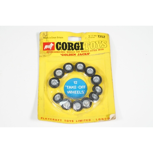 1391 - 19 Carded Corgi Golden Jacks Take off Wheel sets, all showing heavy wear to include card bend and so... 