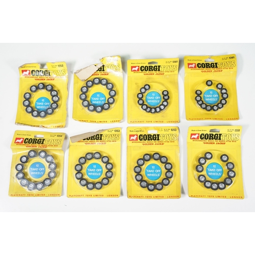 1391 - 19 Carded Corgi Golden Jacks Take off Wheel sets, all showing heavy wear to include card bend and so... 