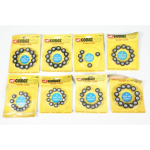 1391 - 19 Carded Corgi Golden Jacks Take off Wheel sets, all showing heavy wear to include card bend and so... 